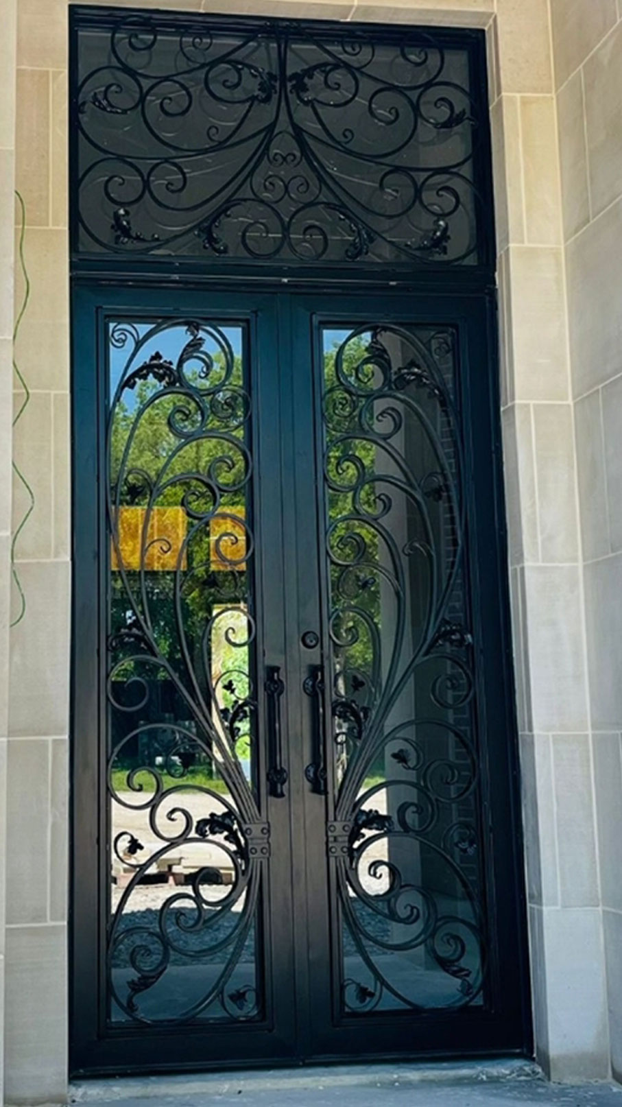 Metal artwork on front door welding services in Waxahachie Texas